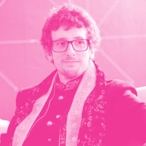 Stefano Gogioso's headshot with a hot pink filter.