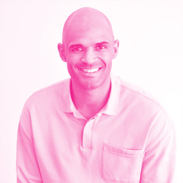 Kenndal McArdle's headshot with a hot pink filter.